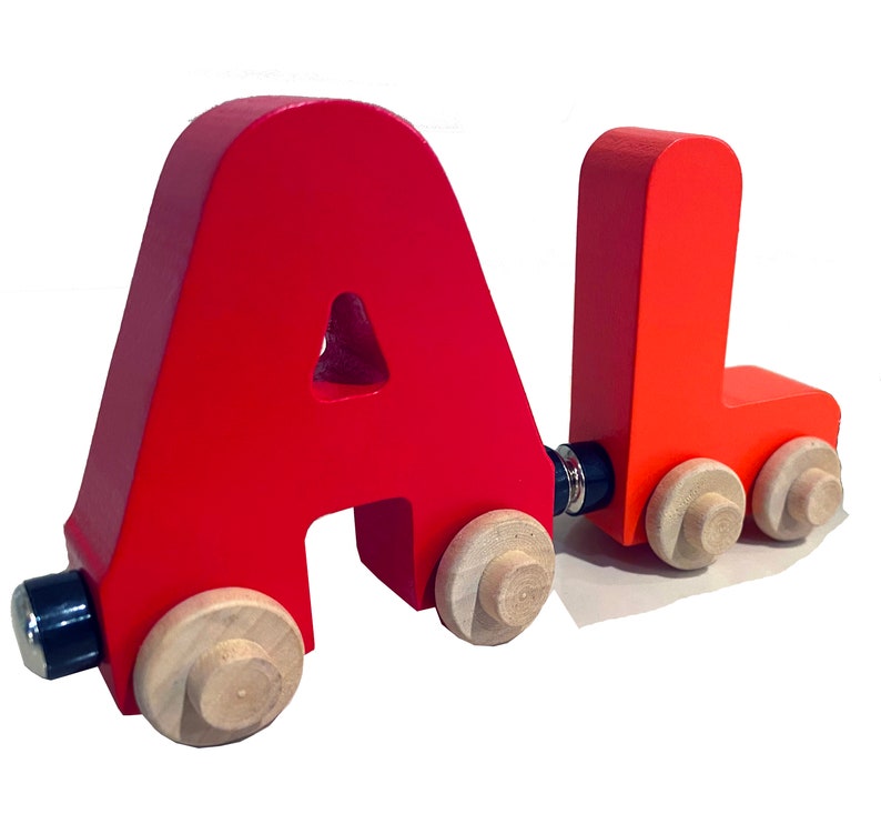 Build your own Train in custom colors of Baby Blue and Yellow. Personalized Wooden Magnetic Alphabet Letters. Engine and Wagon Included.
