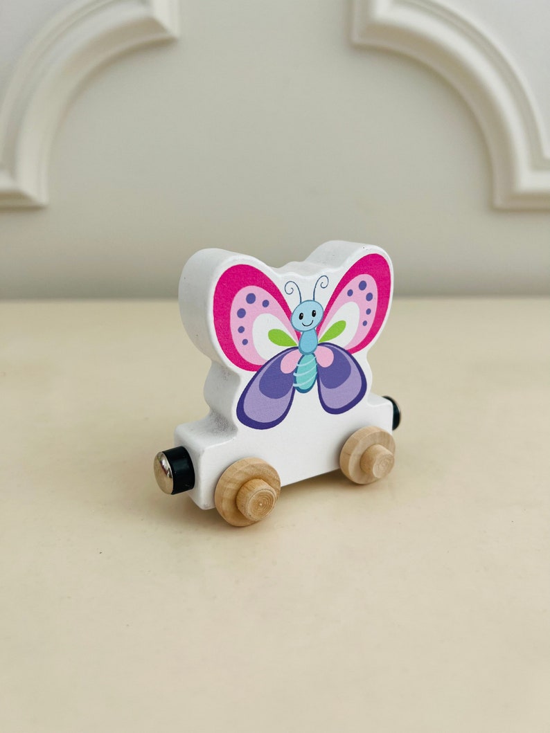 Build your own Train with a Purple and Pink Butterfly. Personalized Wooden Magnetic Alphabet Letters. Kids educational Toy. Name puzzle.