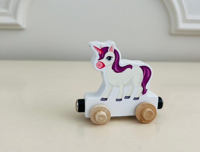 Build your own Train with a Purple and Pink Unicorn. Personalized Wooden Magnetic Alphabet Letters. Kids educational Toy. Name puzzle.