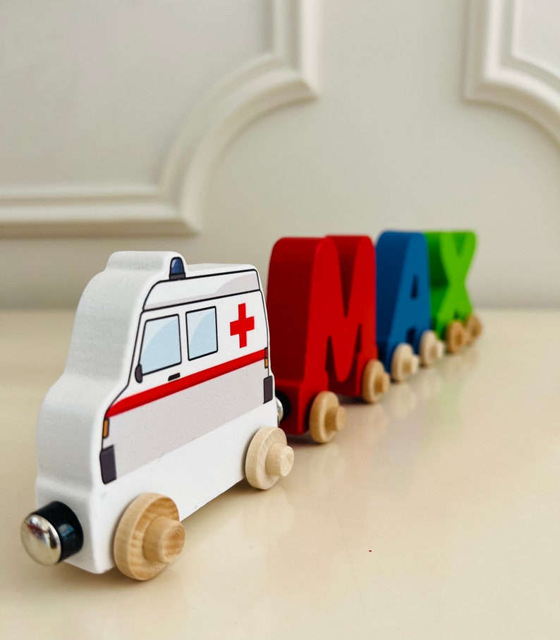 Build your own Train with an ambulance car. Personalized Wooden Magnetic Alphabet Letters. Kids Educational Toy and Room Decoration.