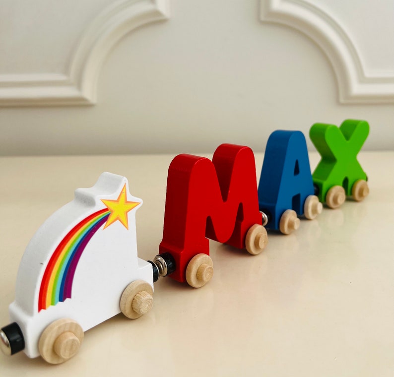 Build your own Train with a Rainbow Shooting Star. Personalized Wooden Magnetic Alphabet Letters. Kids Toy and Room Decoration. Name puzzle.