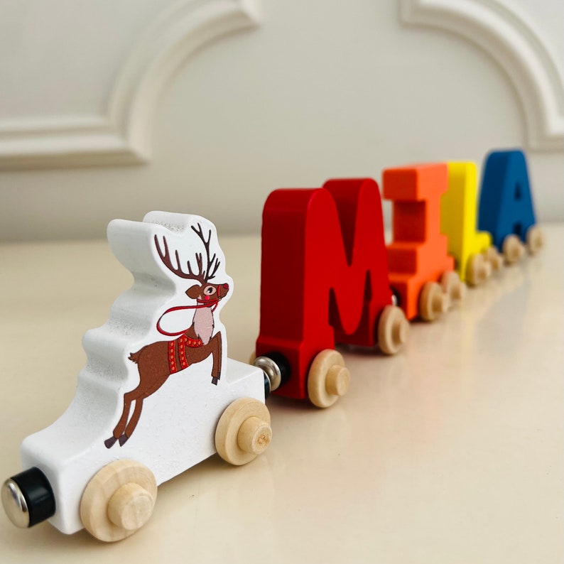 Build your own Train with a Christmas Reindeer. Personalized Wooden Magnetic Alphabet Letters. Kids Toy and Room Decoration. Name puzzle.