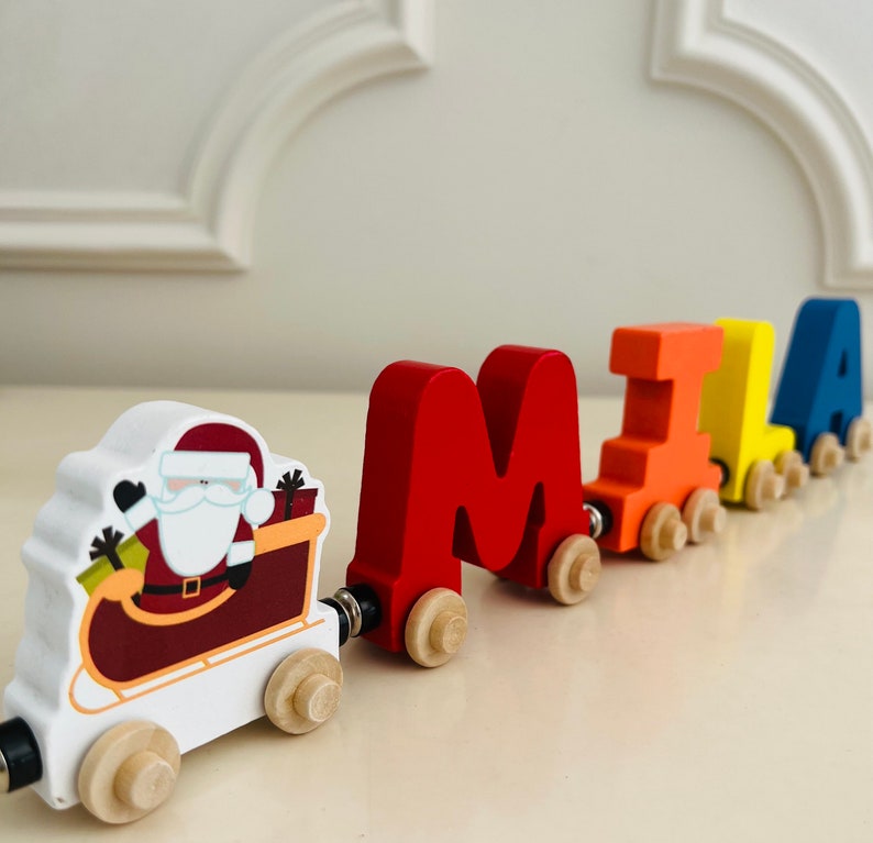 Build your own Train with a Christmas Santa. Personalized Wooden Magnetic Alphabet Letters. Kids Toy and Room Decoration. Name puzzle.