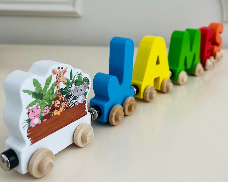Build your own Train with a Jungle Animal Theme. Personalized Wooden Magnetic Alphabet Letters. Kids Toy and Room display. Name puzzle.