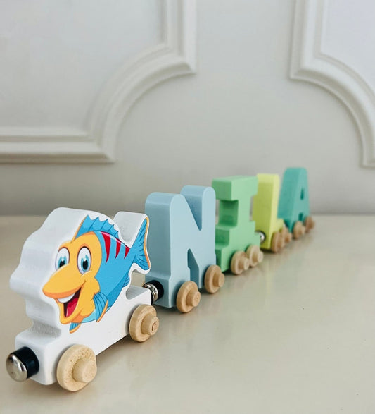 Build your own Train with a Rainbow Fish Ocean theme. Personalized Wooden Magnetic Alphabet Letters. Kids Educational Toy. Name puzzle.