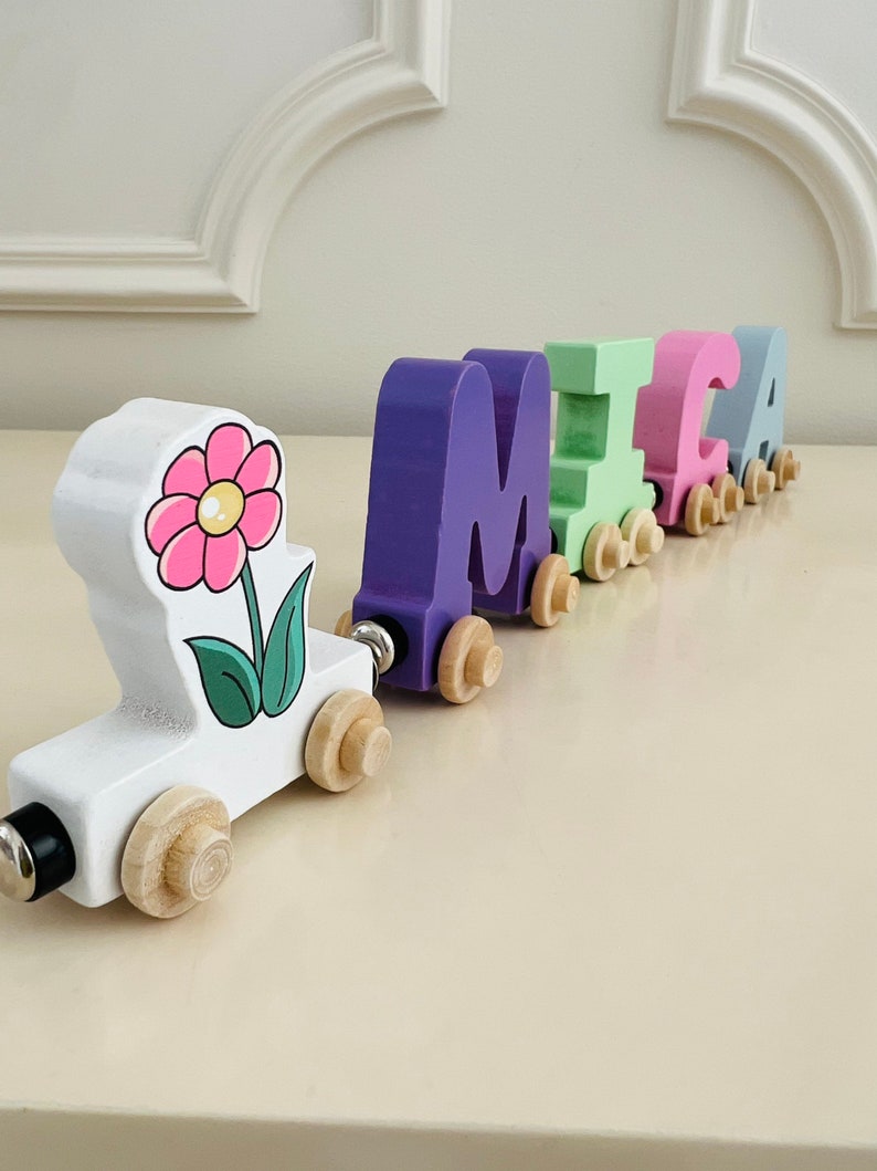 Build your own Train with a Pink Daisy Flower. Personalized Wooden Magnetic Alphabet Letters. Kids educational Toy. Name puzzle.