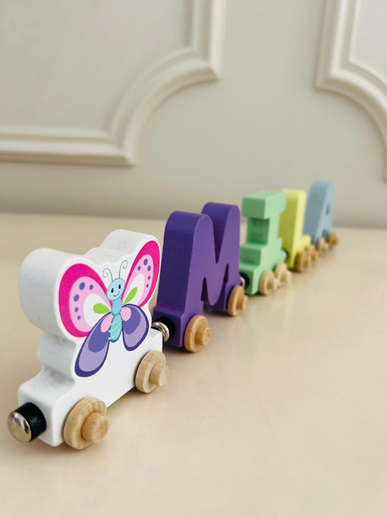 Build your own Train with a Purple and Pink Butterfly. Personalized Wooden Magnetic Alphabet Letters. Kids educational Toy. Name puzzle.