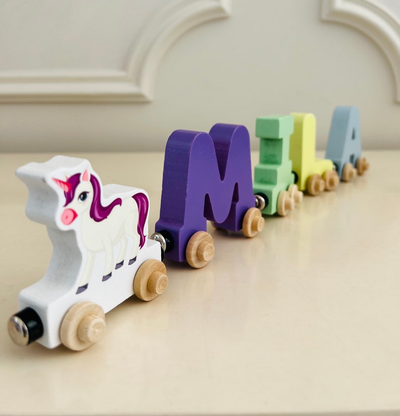 Build your own Train with a Purple and Pink Unicorn. Personalized Wooden Magnetic Alphabet Letters. Kids educational Toy. Name puzzle.