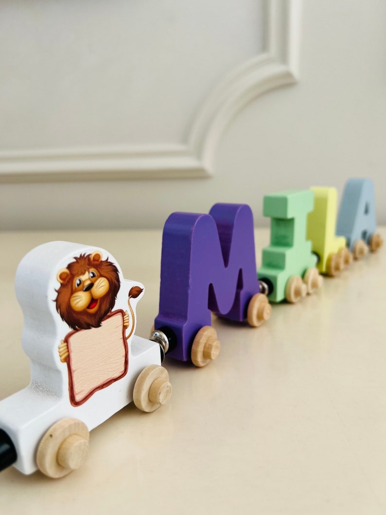 Build your own Train with Lion holding a sign. Personalized Wooden Magnetic Alphabet Letters. Kids educational Toy. Name puzzle.