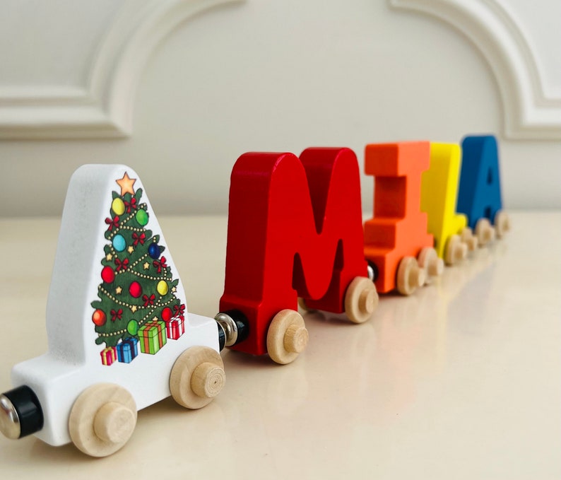 Build your own Train with a Christmas Tree. Personalized Wooden Magnetic Alphabet Letters. Kids Toy and Room Decoration. Name puzzle.