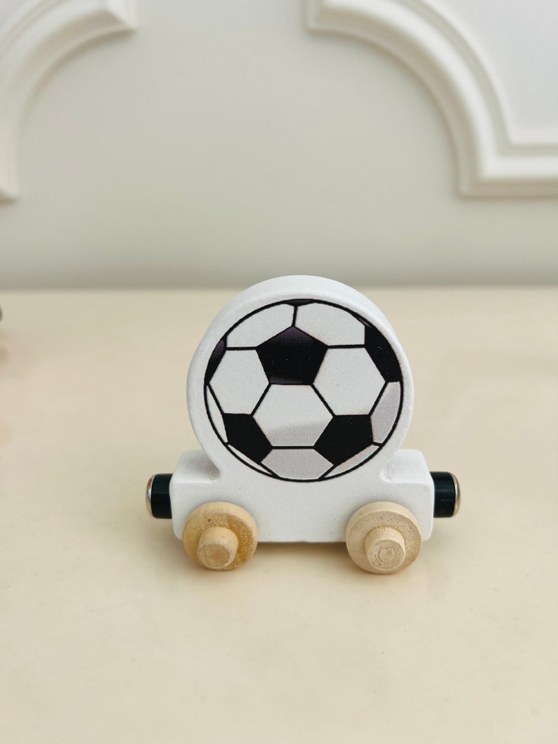Build your own Train with a Soccer Ball Sport Theme. Personalized Wooden Magnetic Alphabet Letters. Kids Toy and Room display. Name puzzle.
