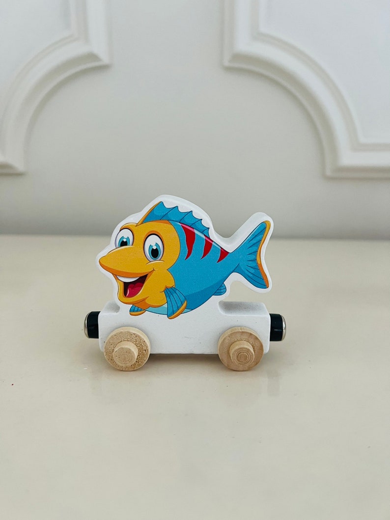 Build your own Train with a Rainbow Fish Ocean theme. Personalized Wooden Magnetic Alphabet Letters. Kids Educational Toy. Name puzzle.